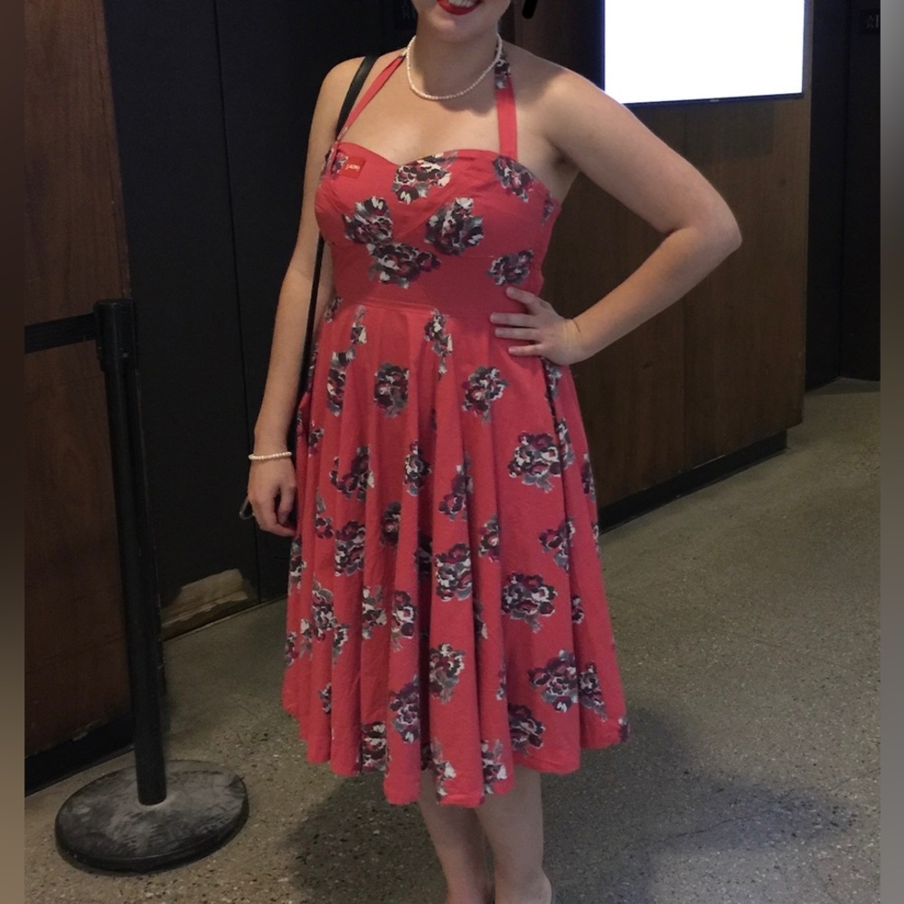 Vintage inspired pink floral halter swing dress with full skirt, tea length